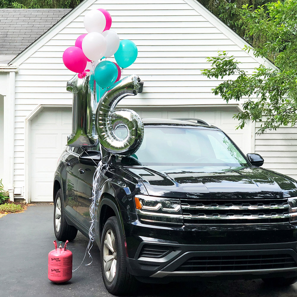 Car with jumbo 16 balloons