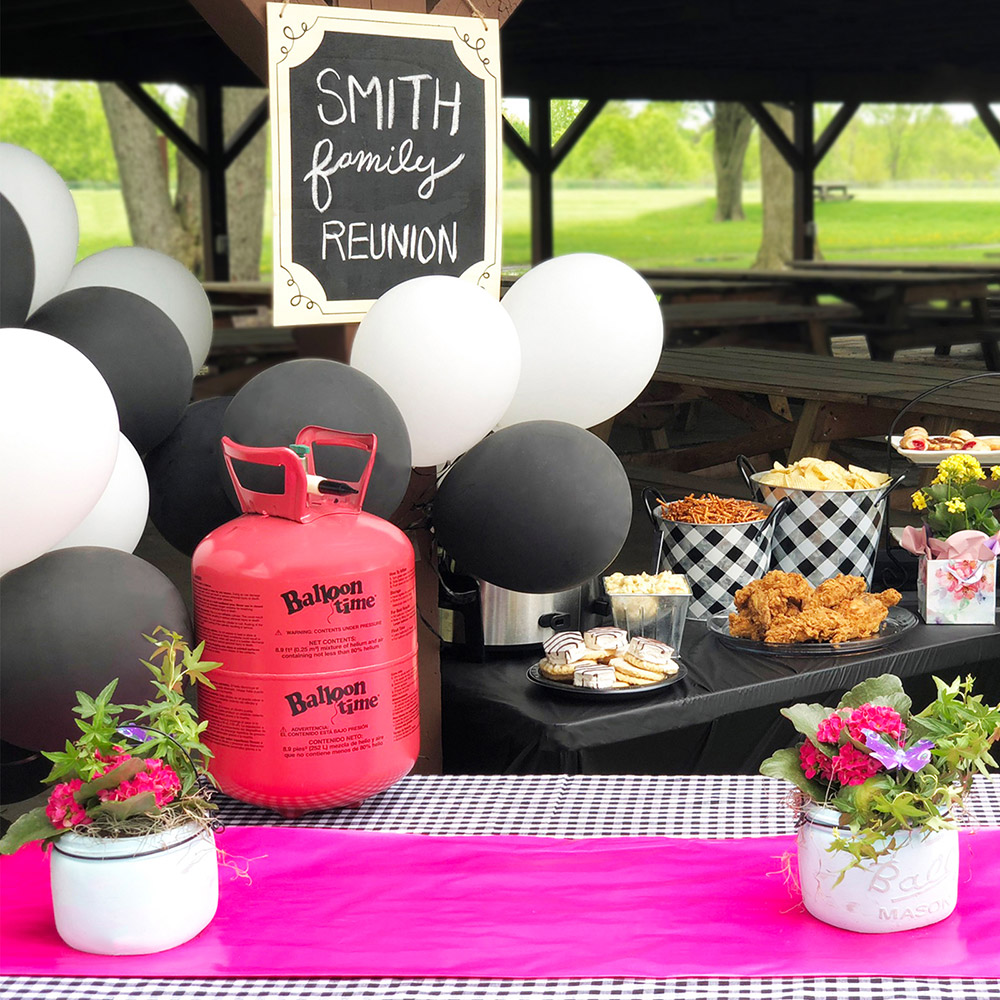 Black and white picnic setting with balloons