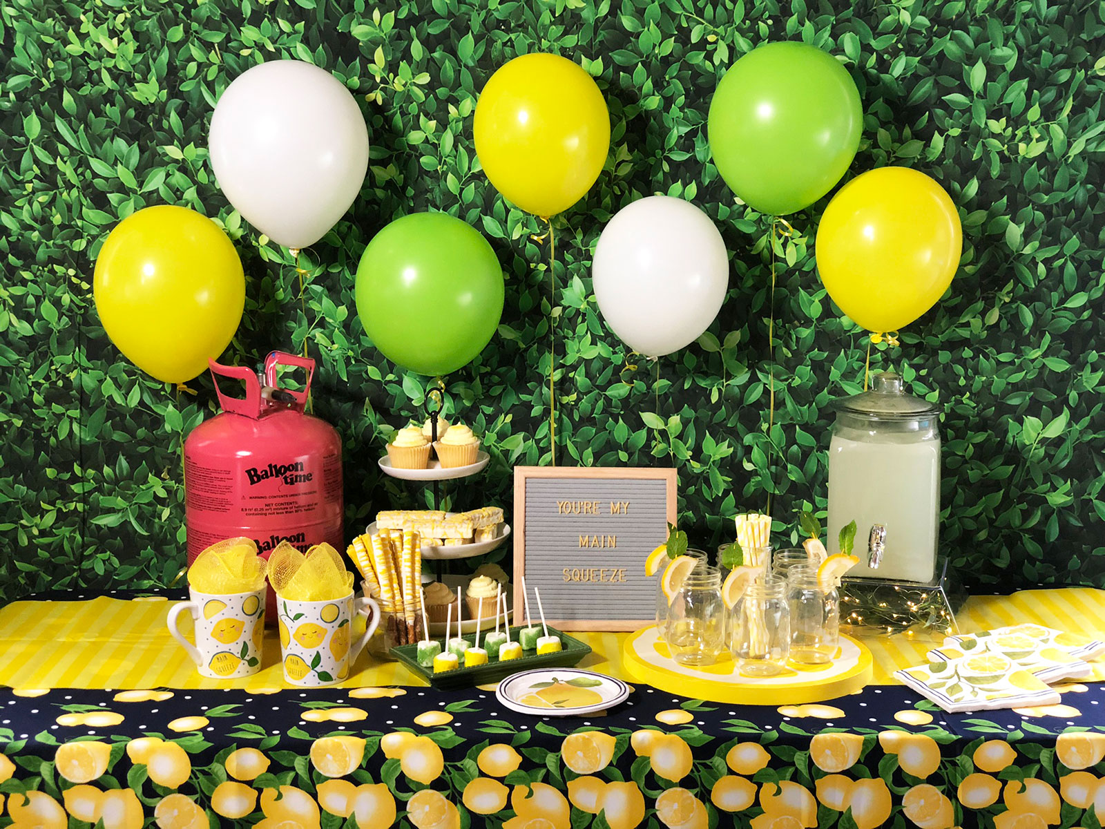 Decorative picnic table with balloon centerpiece