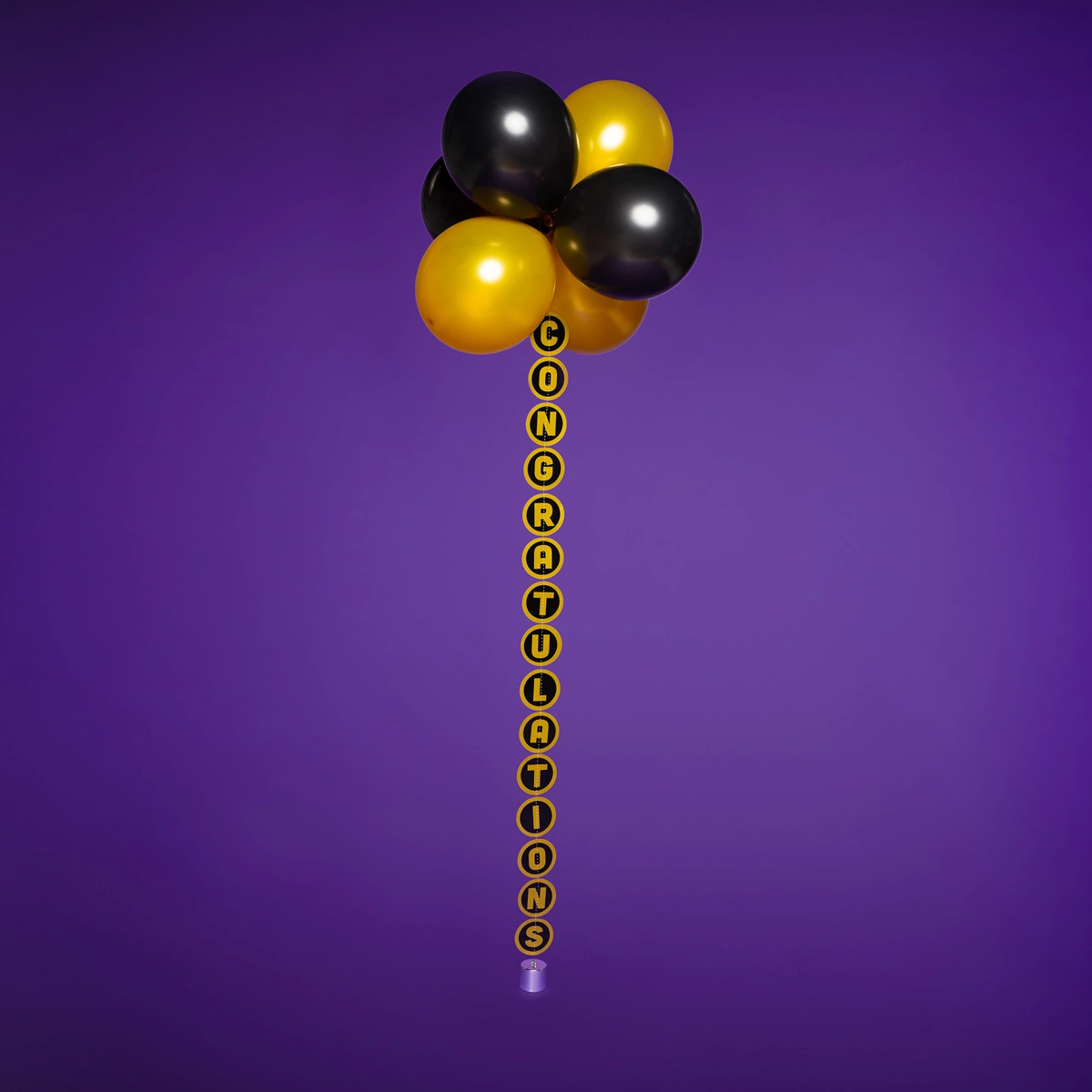 Congratulations balloon tail with black and gold floating balloons